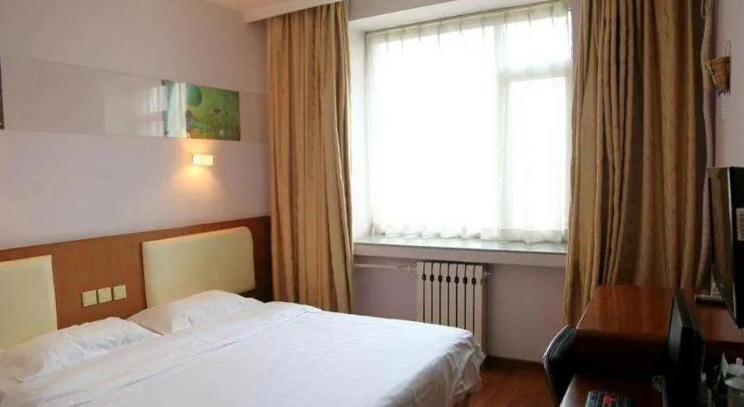 Bed in Super 8 Hotel Beijing International Exhibition Center