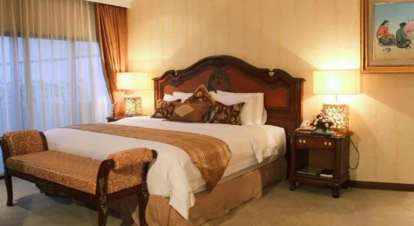 Bed in Danau Toba Hotel International