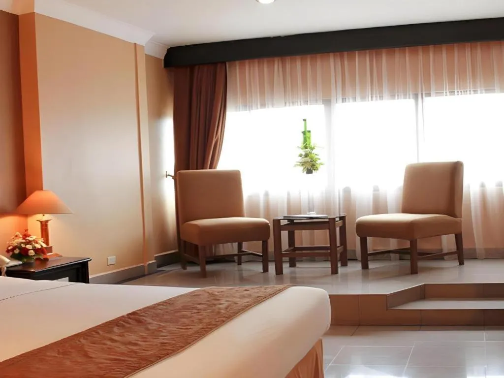 Bed in Danau Toba Hotel International