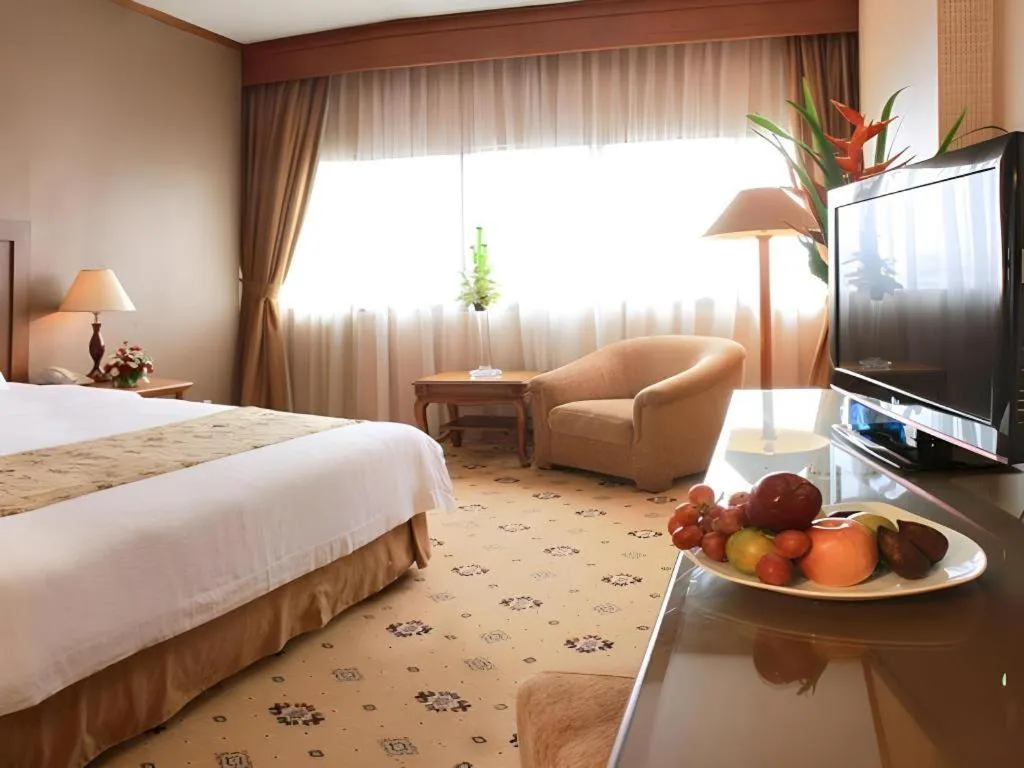 Bed in Danau Toba Hotel International