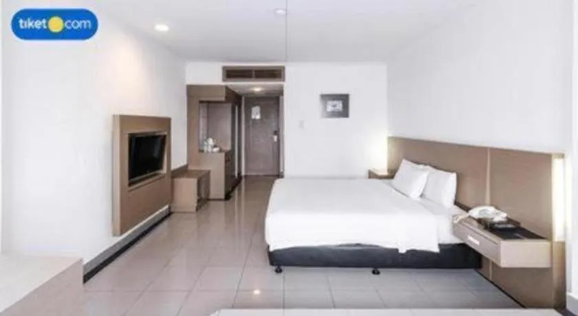 Bed in Danau Toba Hotel International