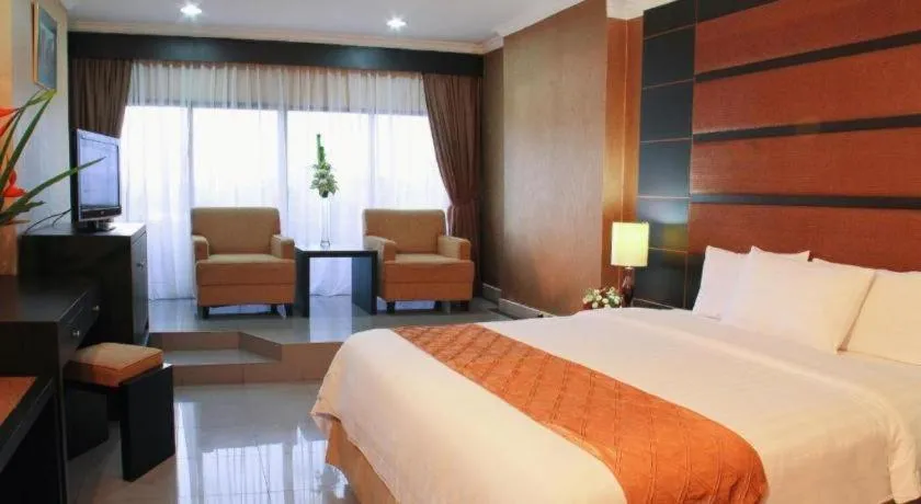 Bed in Danau Toba Hotel International
