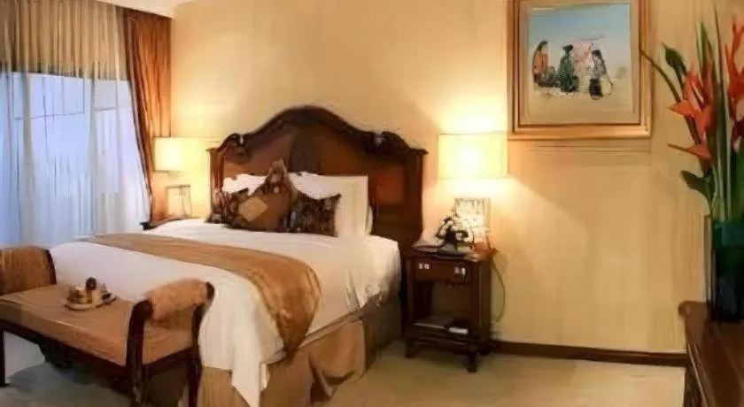 Bed in Danau Toba Hotel International