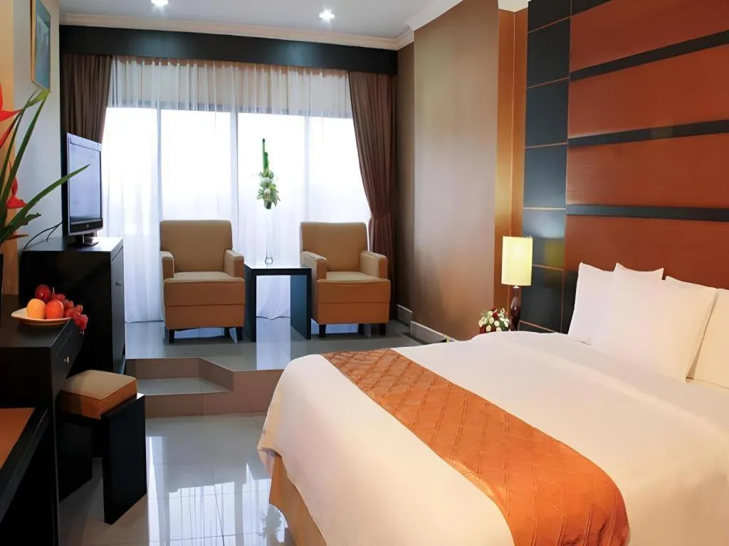 Bed in Danau Toba Hotel International