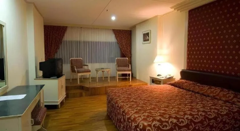 Bed in Danau Toba Hotel International