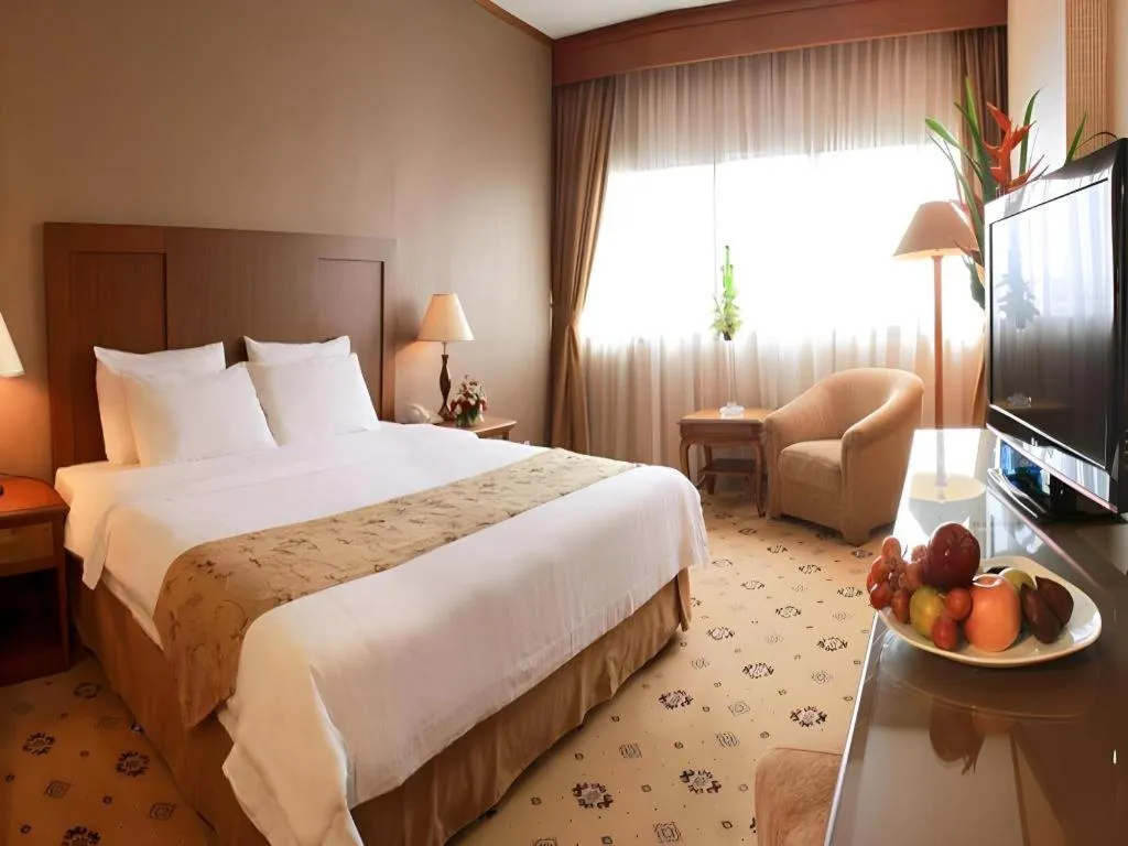 Bed in Danau Toba Hotel International