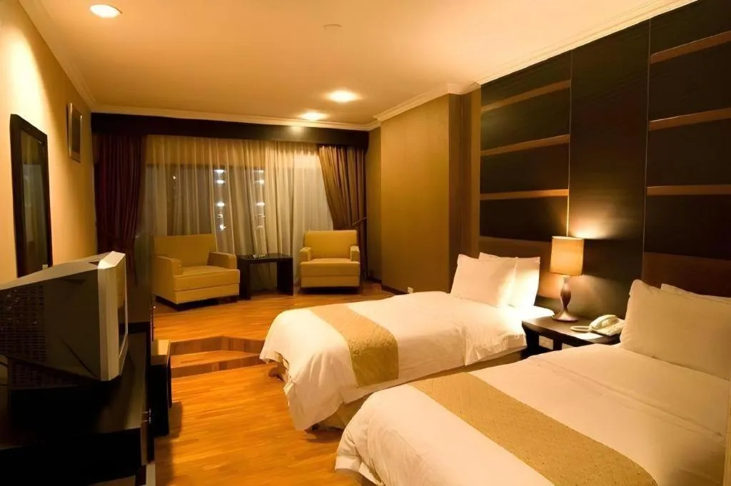 Bed in Danau Toba Hotel International