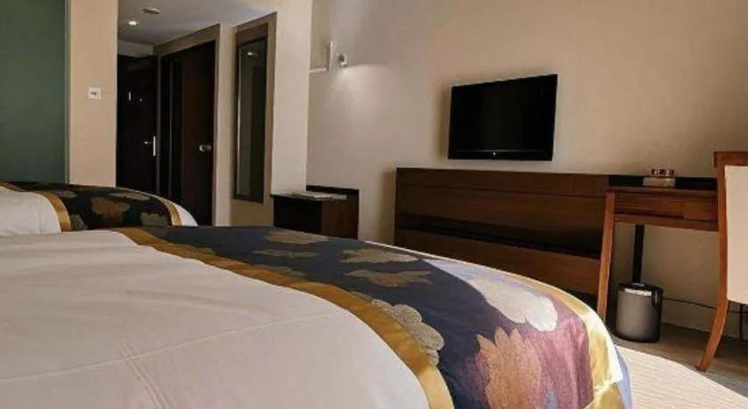 Bed in Jinggangshan ZhongTaiLai International Hotel