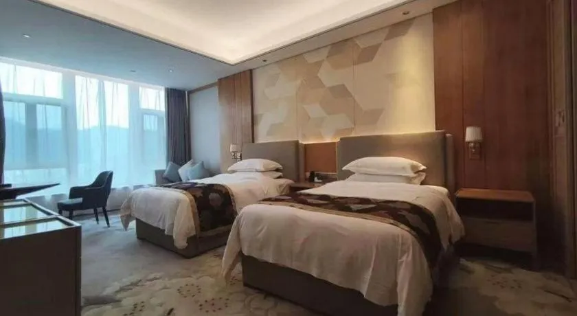 Bed in Jinggangshan ZhongTaiLai International Hotel