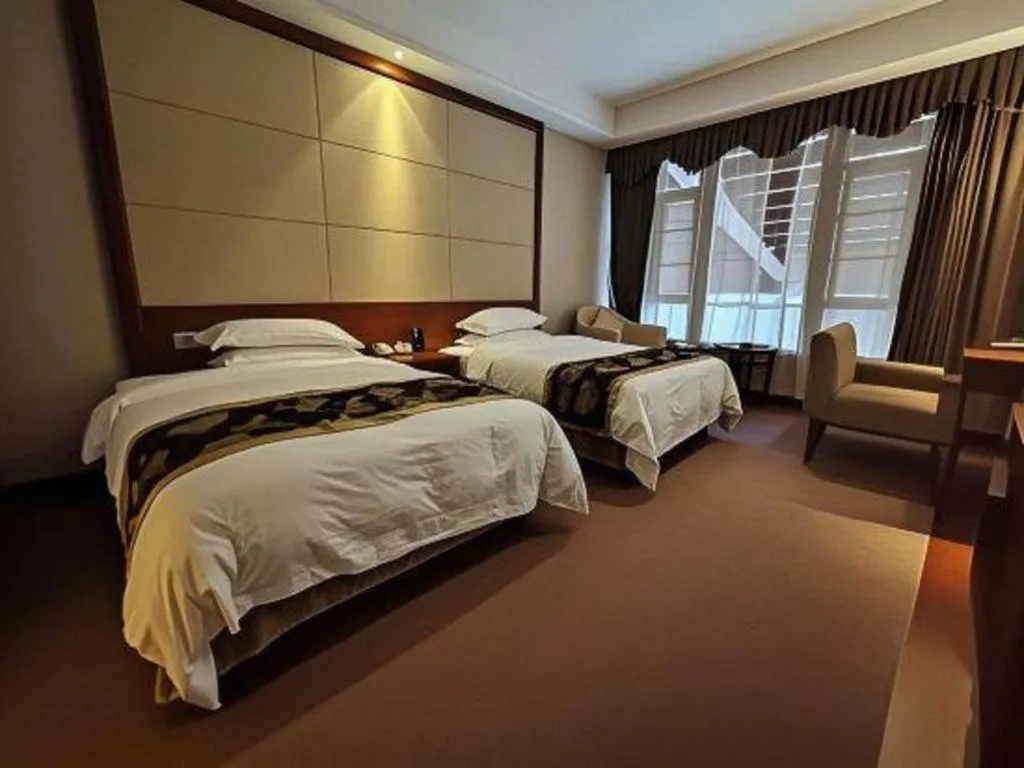 Bed in Jinggangshan ZhongTaiLai International Hotel