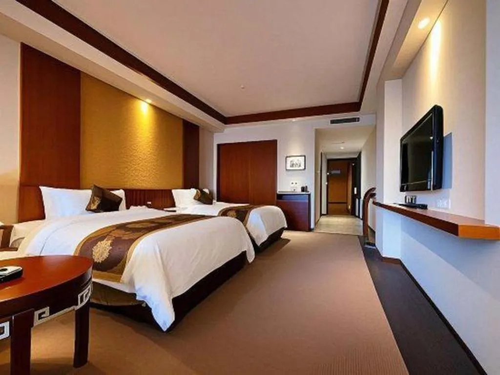 Bed in Jinggangshan ZhongTaiLai International Hotel