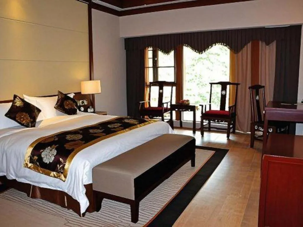 Bed in Jinggangshan ZhongTaiLai International Hotel