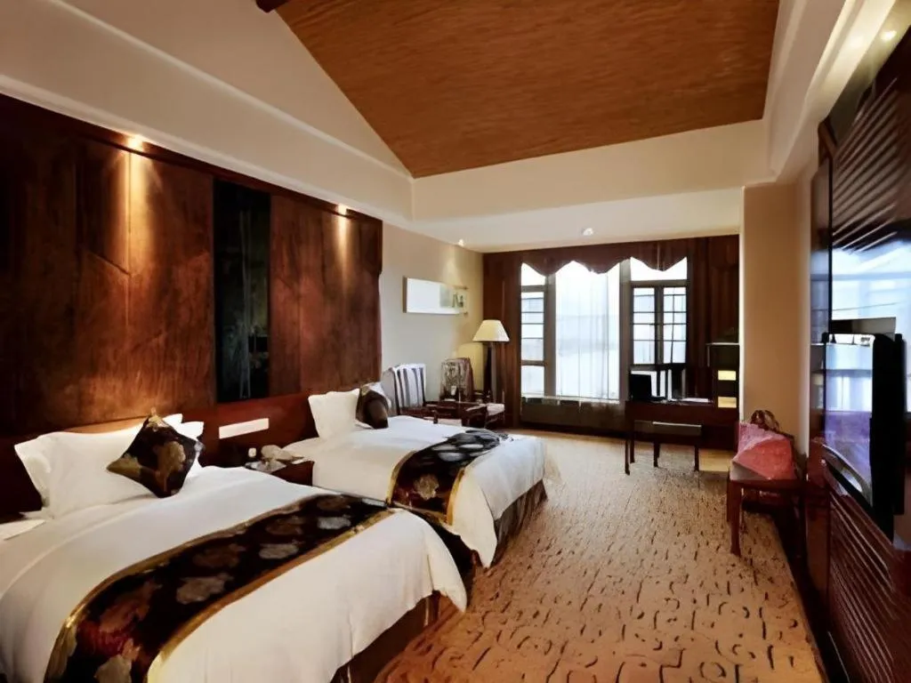 Bed in Jinggangshan ZhongTaiLai International Hotel