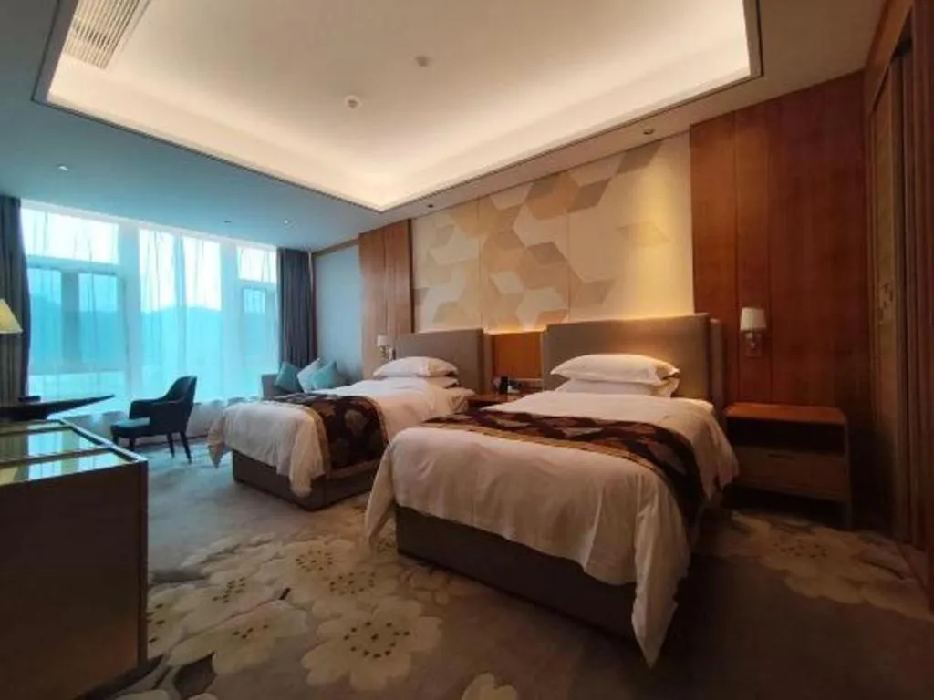 Bed in Jinggangshan ZhongTaiLai International Hotel