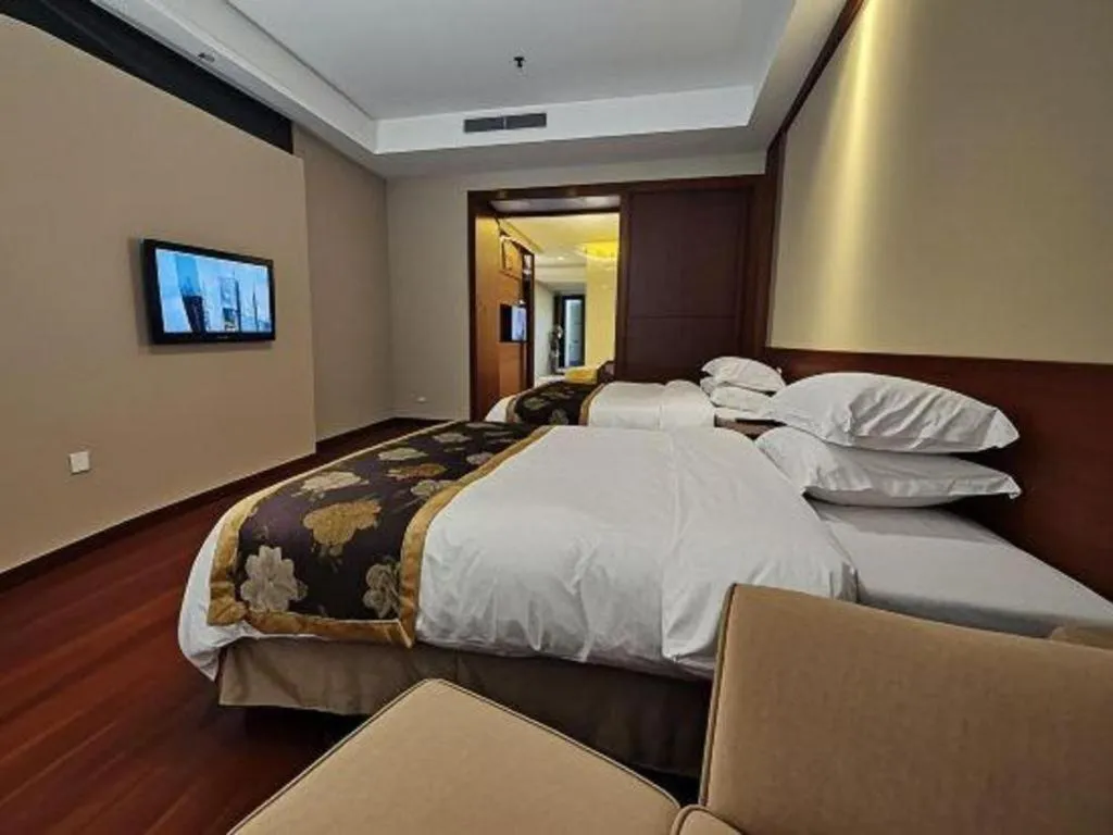 Bed in Jinggangshan ZhongTaiLai International Hotel