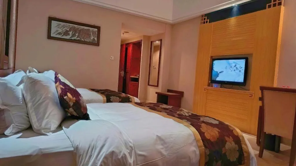 Bed in Jinggangshan ZhongTaiLai International Hotel