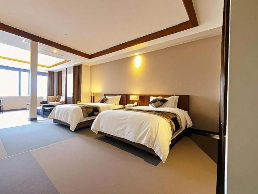 Bed in Jinggangshan ZhongTaiLai International Hotel