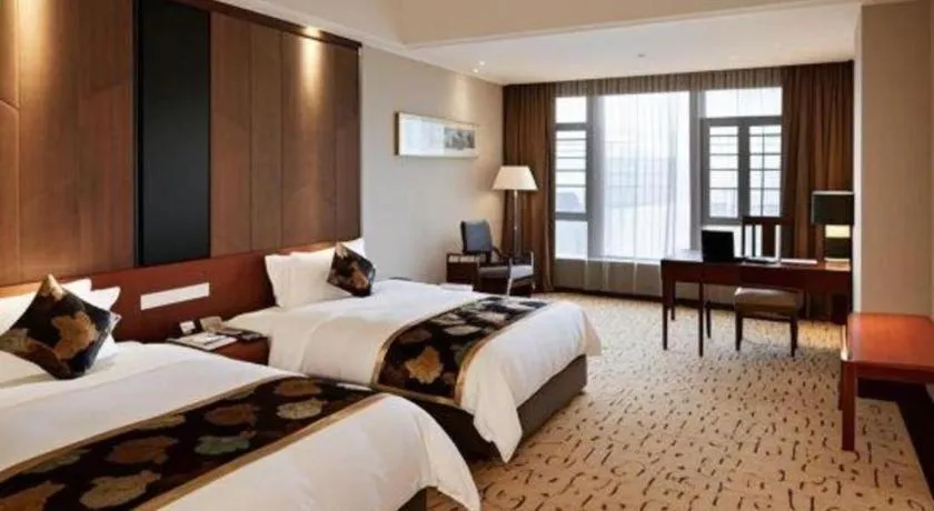 Bed in Jinggangshan ZhongTaiLai International Hotel