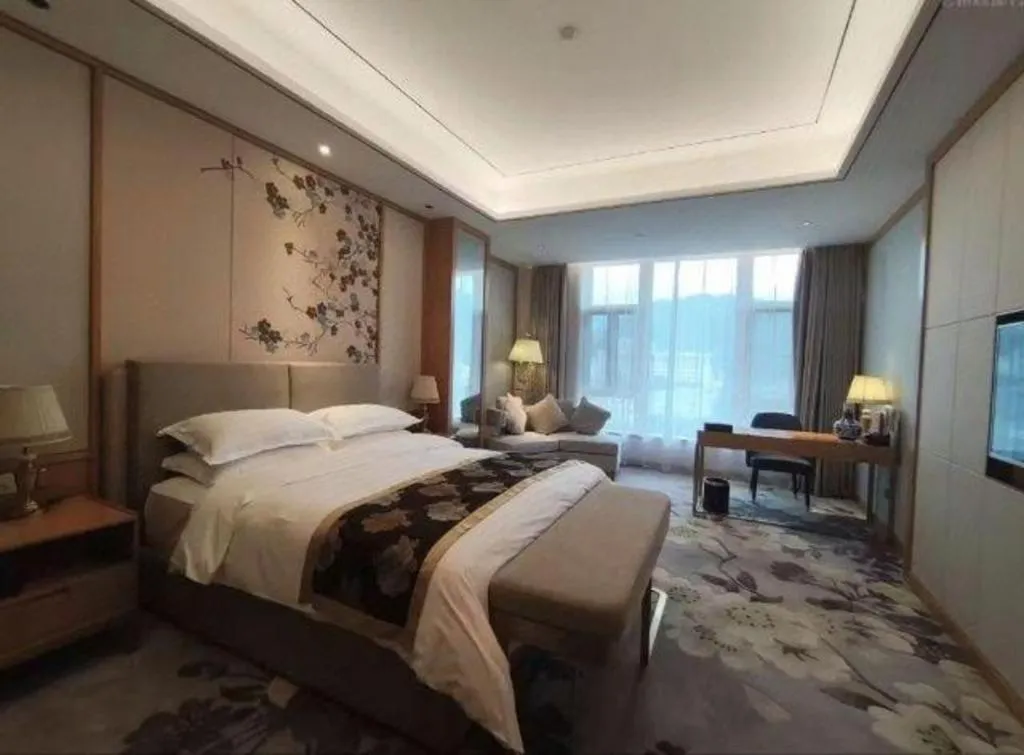 Bed in Jinggangshan ZhongTaiLai International Hotel