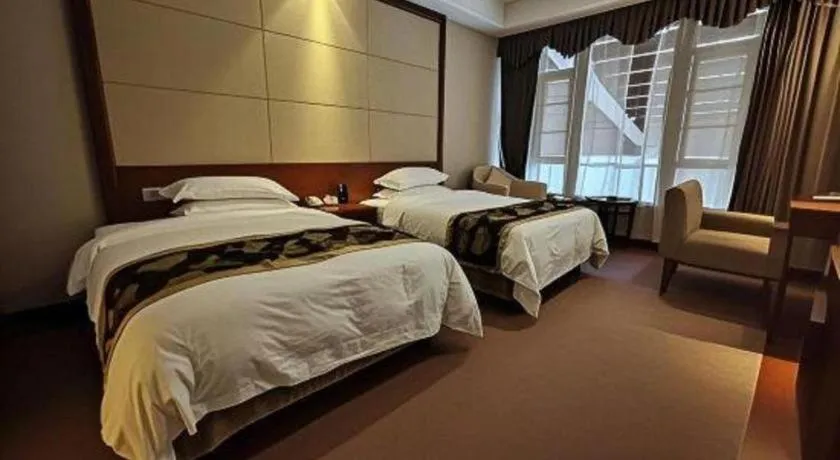 Bed in Jinggangshan ZhongTaiLai International Hotel