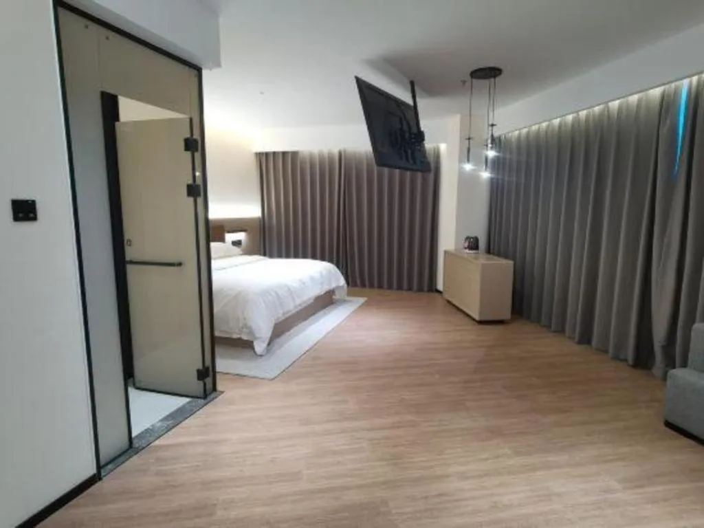 Bed in Jinggangshan ZhongTaiLai International Hotel