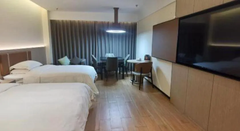 Bed in Jinggangshan ZhongTaiLai International Hotel