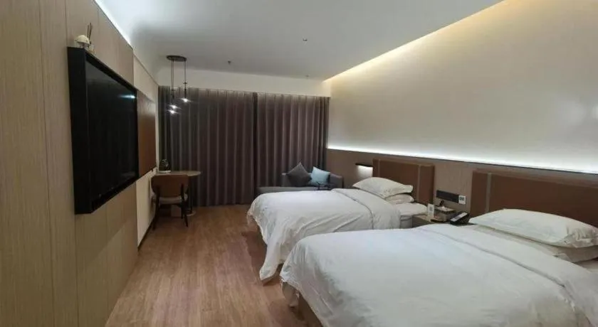 Bed in Jinggangshan ZhongTaiLai International Hotel