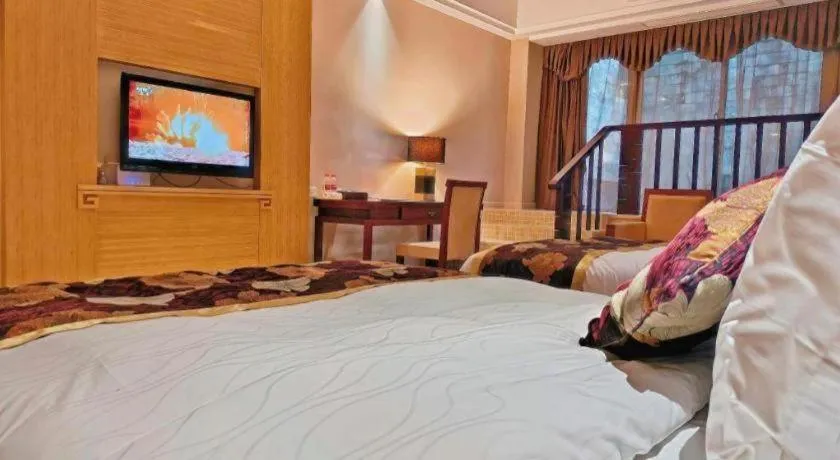 Bed in Jinggangshan ZhongTaiLai International Hotel