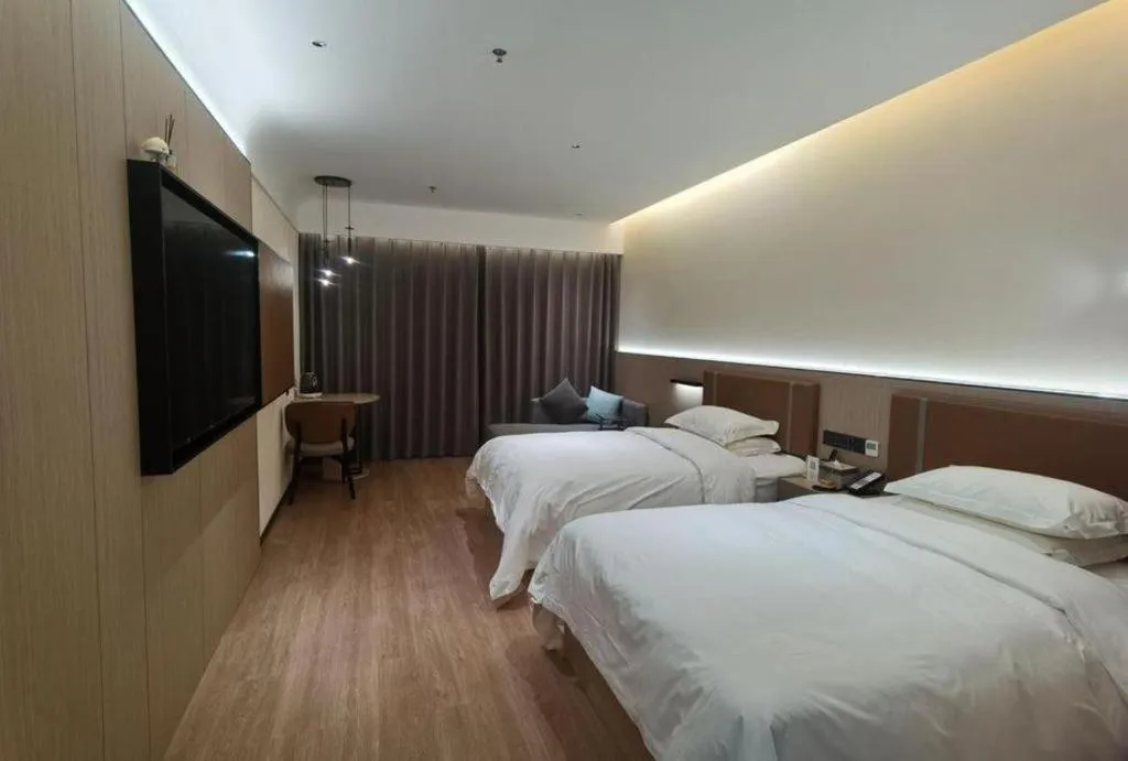 Bed in Jinggangshan ZhongTaiLai International Hotel