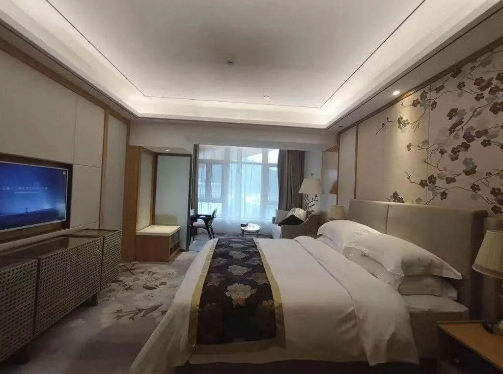 Bed in Jinggangshan ZhongTaiLai International Hotel