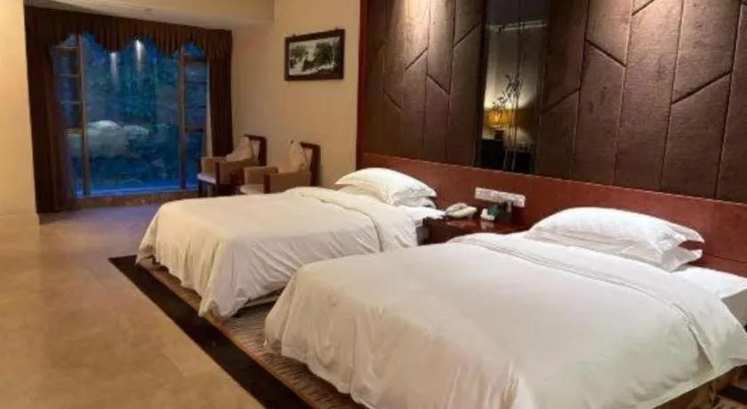 Bed in Jinggangshan ZhongTaiLai International Hotel