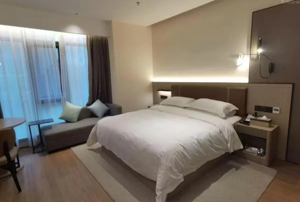Bed in Jinggangshan ZhongTaiLai International Hotel