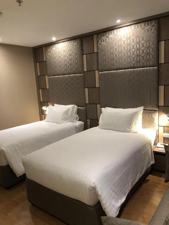 Bed in Sri U-Thong Grand Hotel