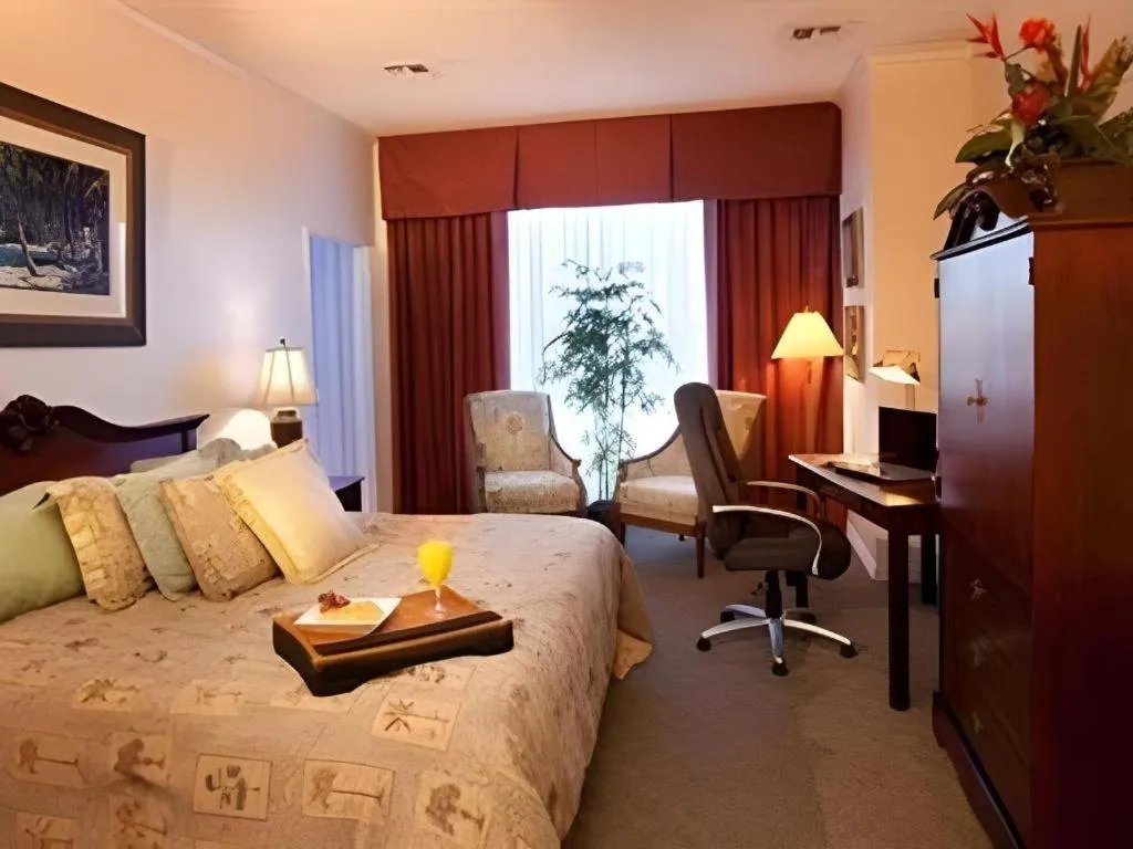 Bed in Magnuson Grand Conference Hotel