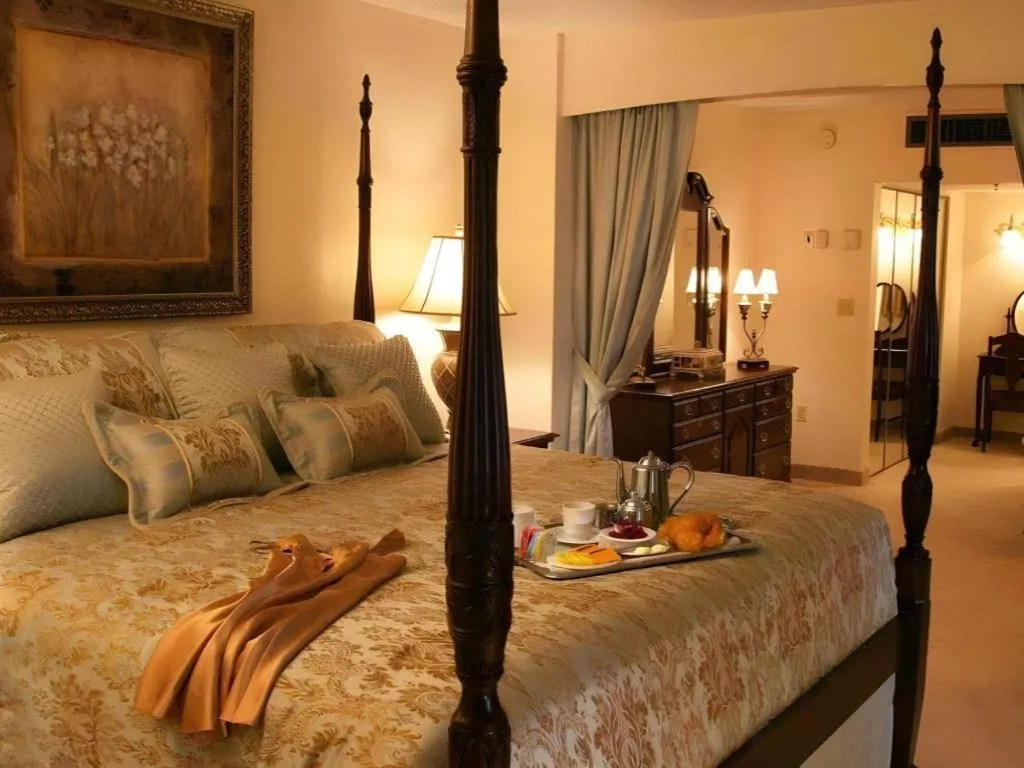 Bed in Magnuson Grand Conference Hotel