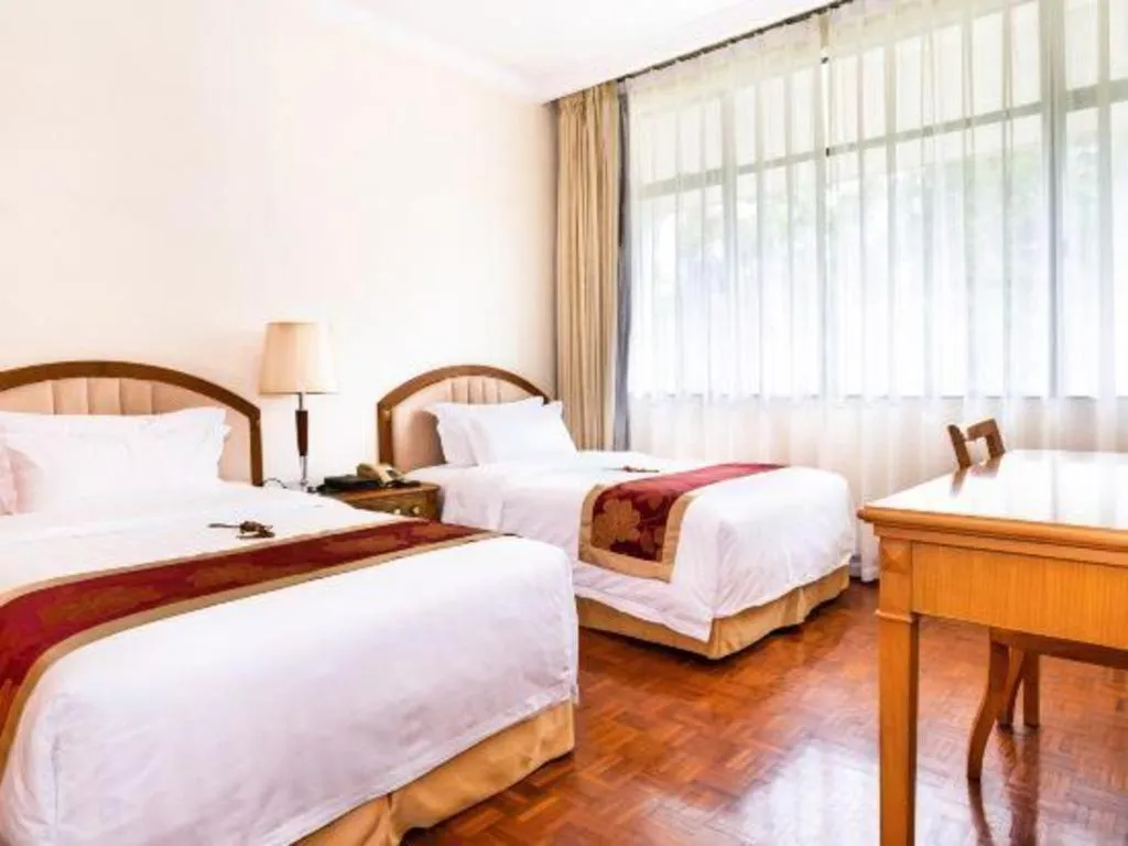 Bed in Nanhai Oil Hotel