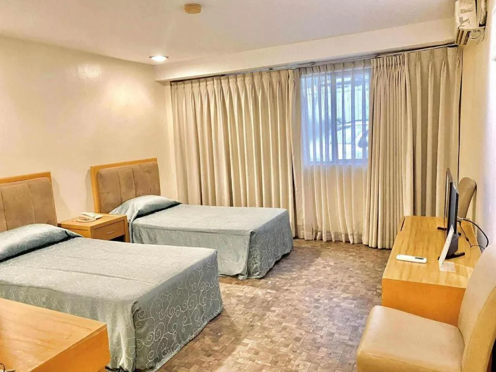 Bed in Bayfront Hotel Subic