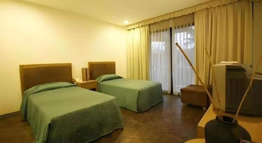 Bed in Bayfront Hotel Subic