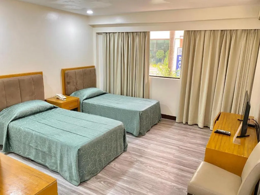 Bed in Bayfront Hotel Subic