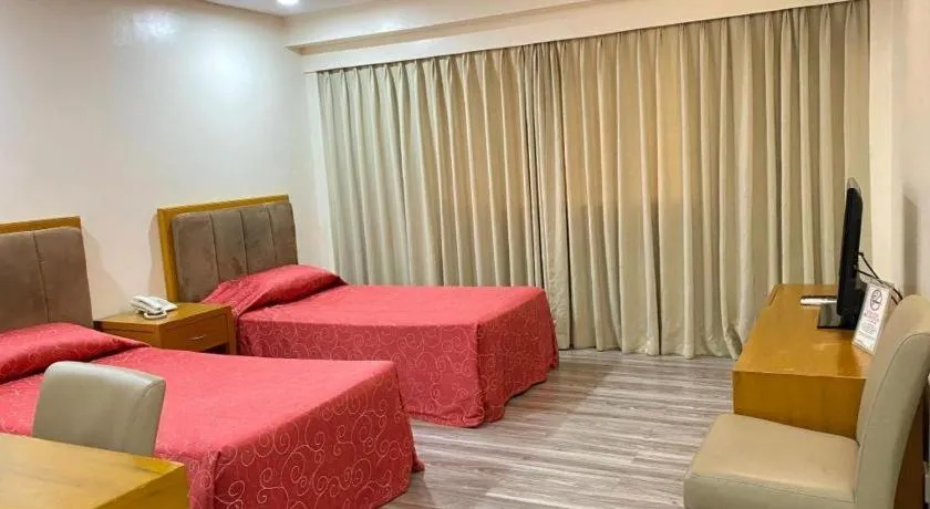 Bed in Bayfront Hotel Subic