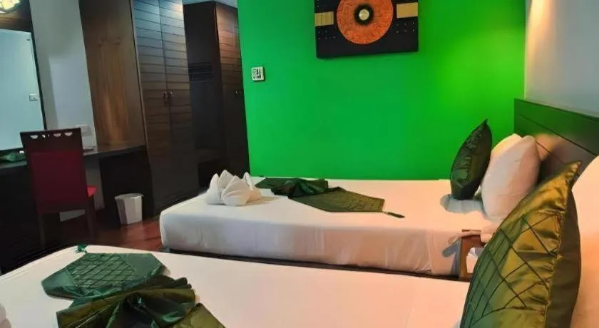 Bed in The Ligor City Hotel