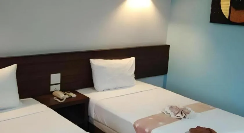 Bed in The Ligor City Hotel