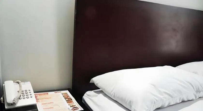 Bed in Win Hotel Blok M