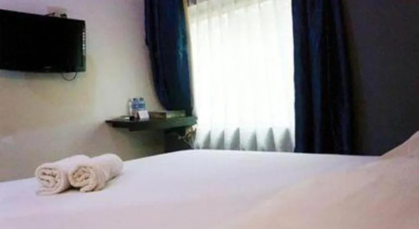 Bed in Win Hotel Blok M