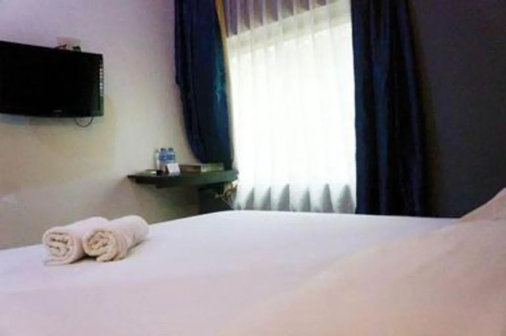 Bed in Win Hotel Blok M