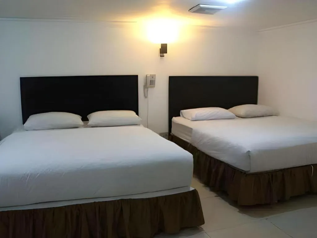 Bed in Win Hotel Blok M