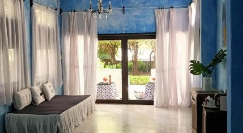 Bed in Brassiere Beach Hotel