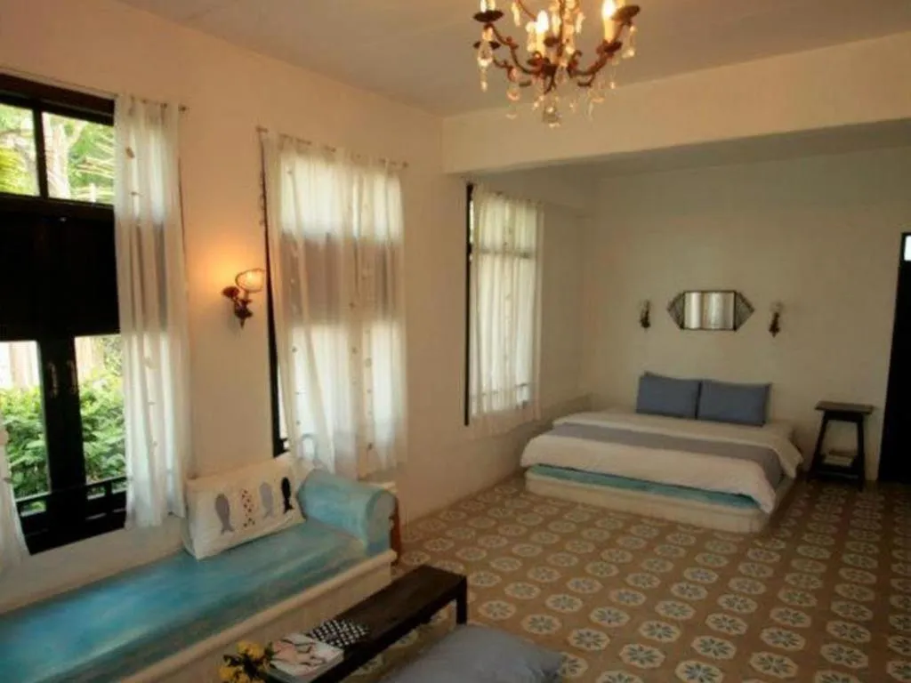 Bed in Brassiere Beach Hotel