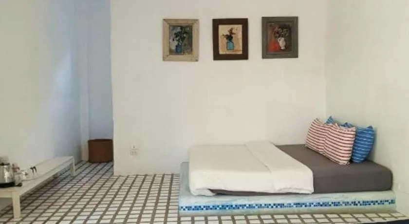 Bed in Brassiere Beach Hotel