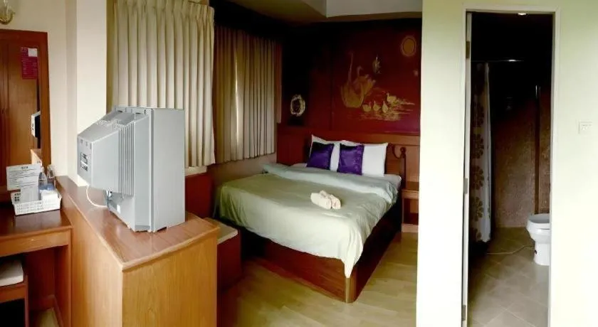 Bed in Loei Orchid Hotel